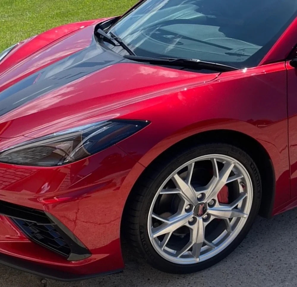 Red Corvette windshield. Windshield installed.