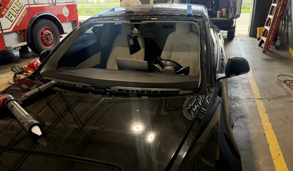 Sedan windshield. Windshield removed.